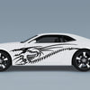 white sports car with black dragon skeleton vinyl decal on driver side