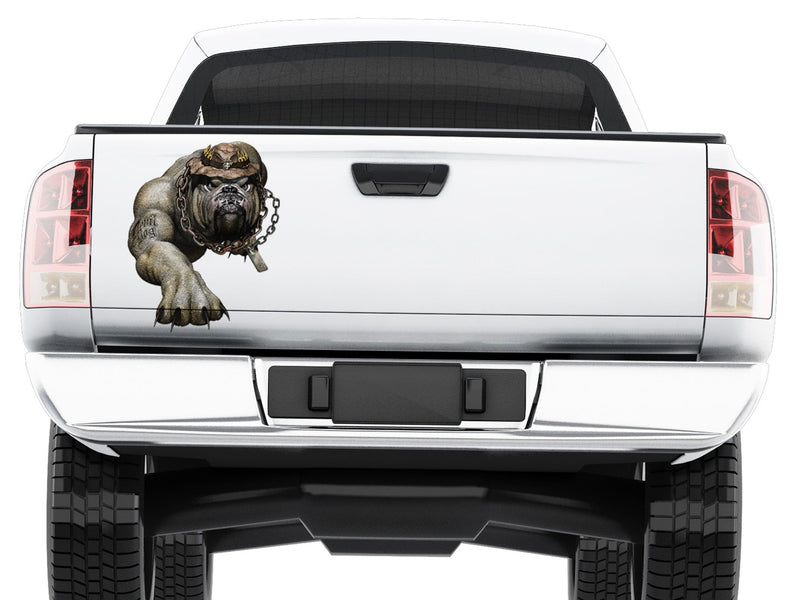 white truck tailgate with devil dog decal graphics on it