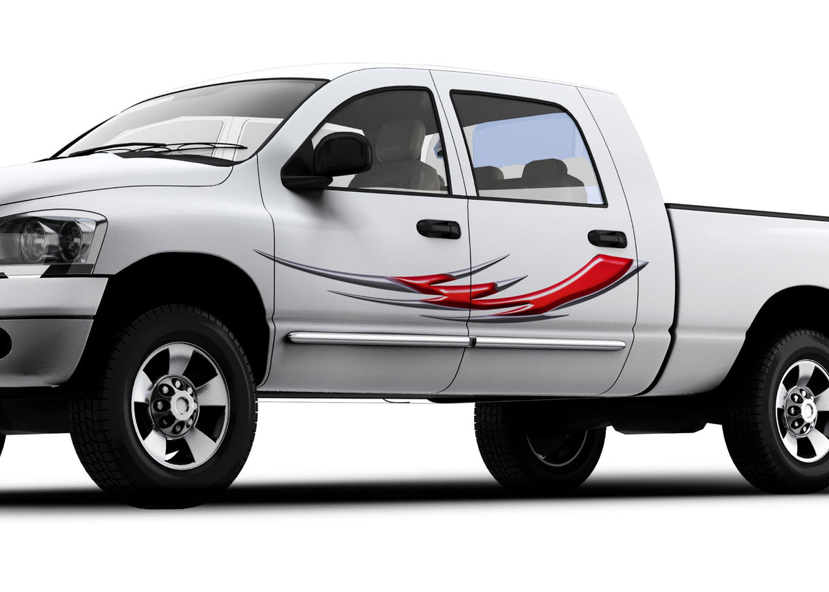 white truck with Red tribal blade vinyl decal on driver side