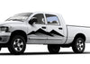 white truck with black mountain silhoute decal on driver side