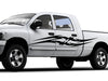 white truck with black tribal spears vinyl decal on driver side