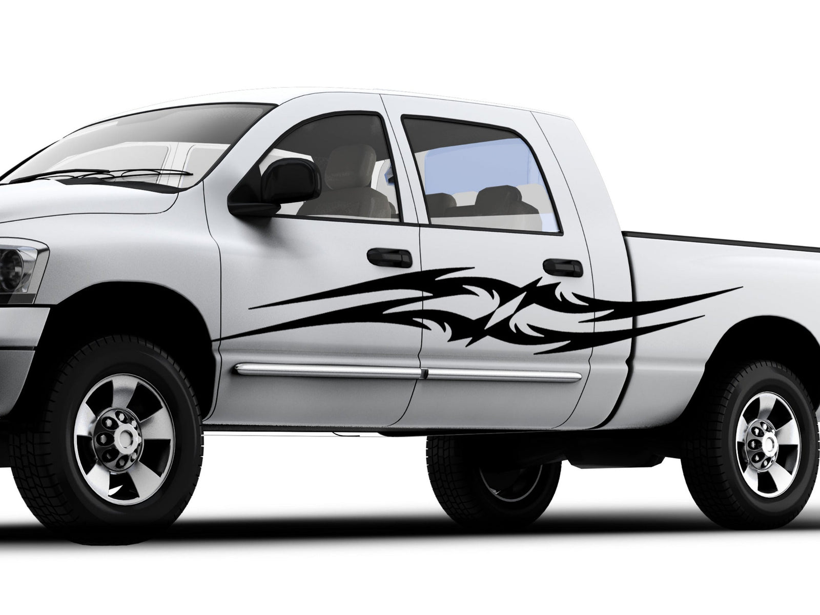white truck with black tribal spears vinyl decal on driver side