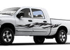 white truck with black tribal streak vinyl decal on driver side