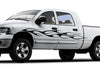 white truck with classic vinyl cut black flames on driver side