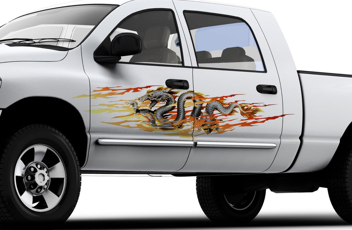 white truck with dragon flames vinyl decal on driver side
