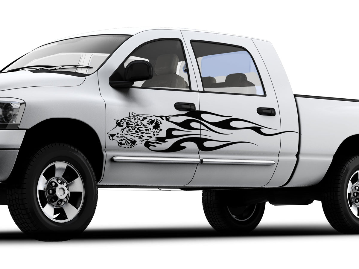 white truck with jaguar flames vinyl cut decal on driver side