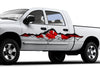 white truck with large canadian flag rip vinyl decal on its cab side
