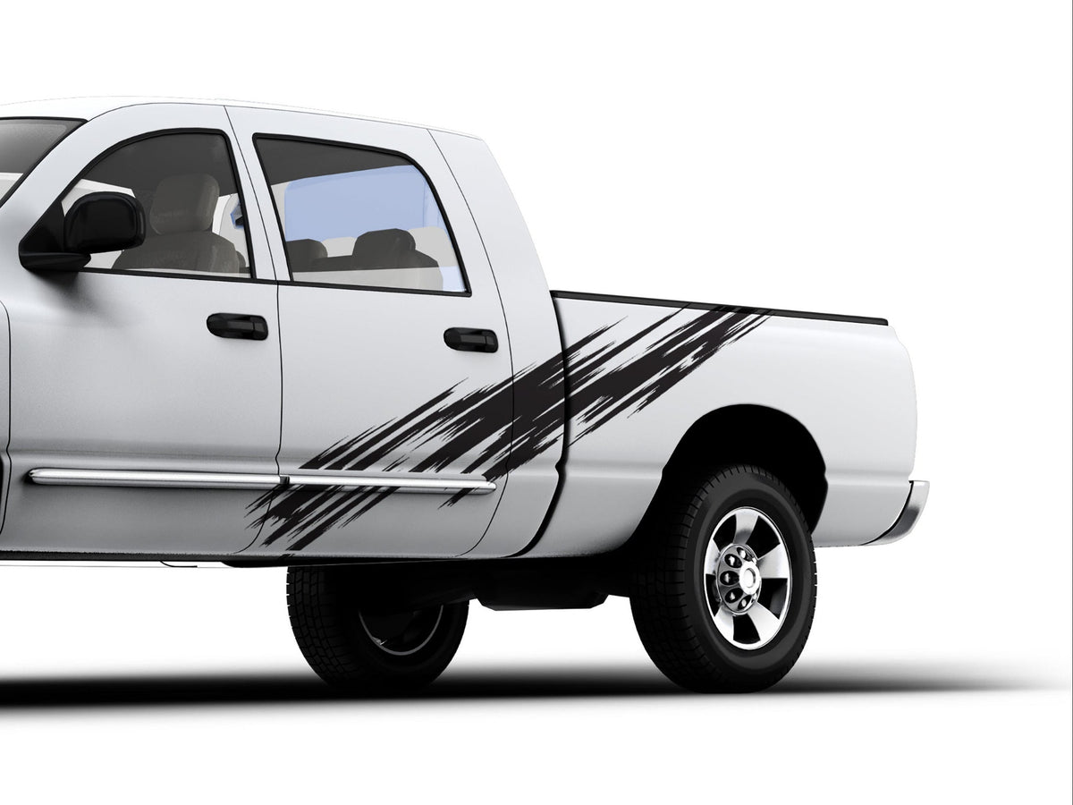 white truck with scratch style 3 black vinyl cut graphics on driver side