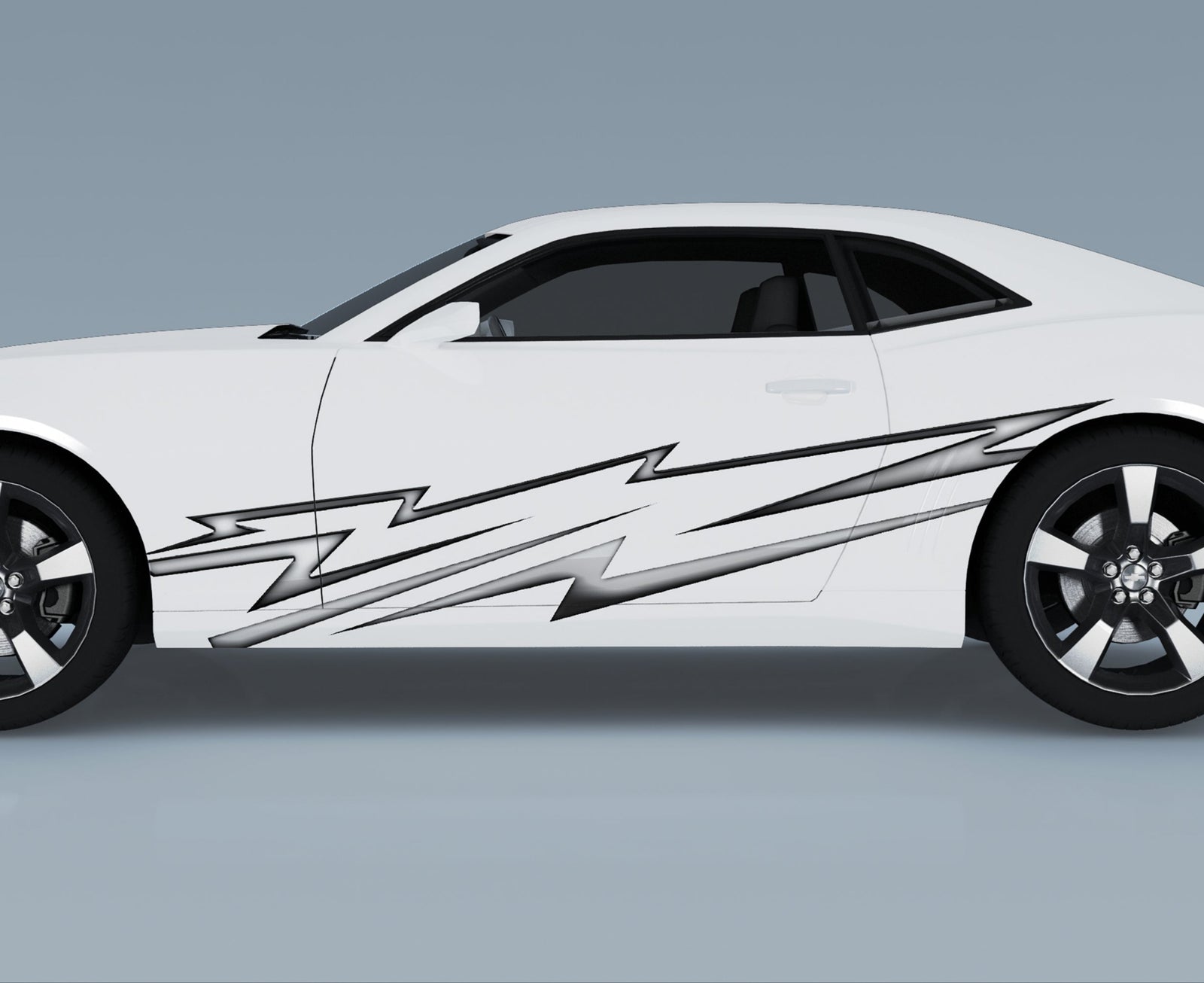 white camaro with silver electro vinyl decal on its side