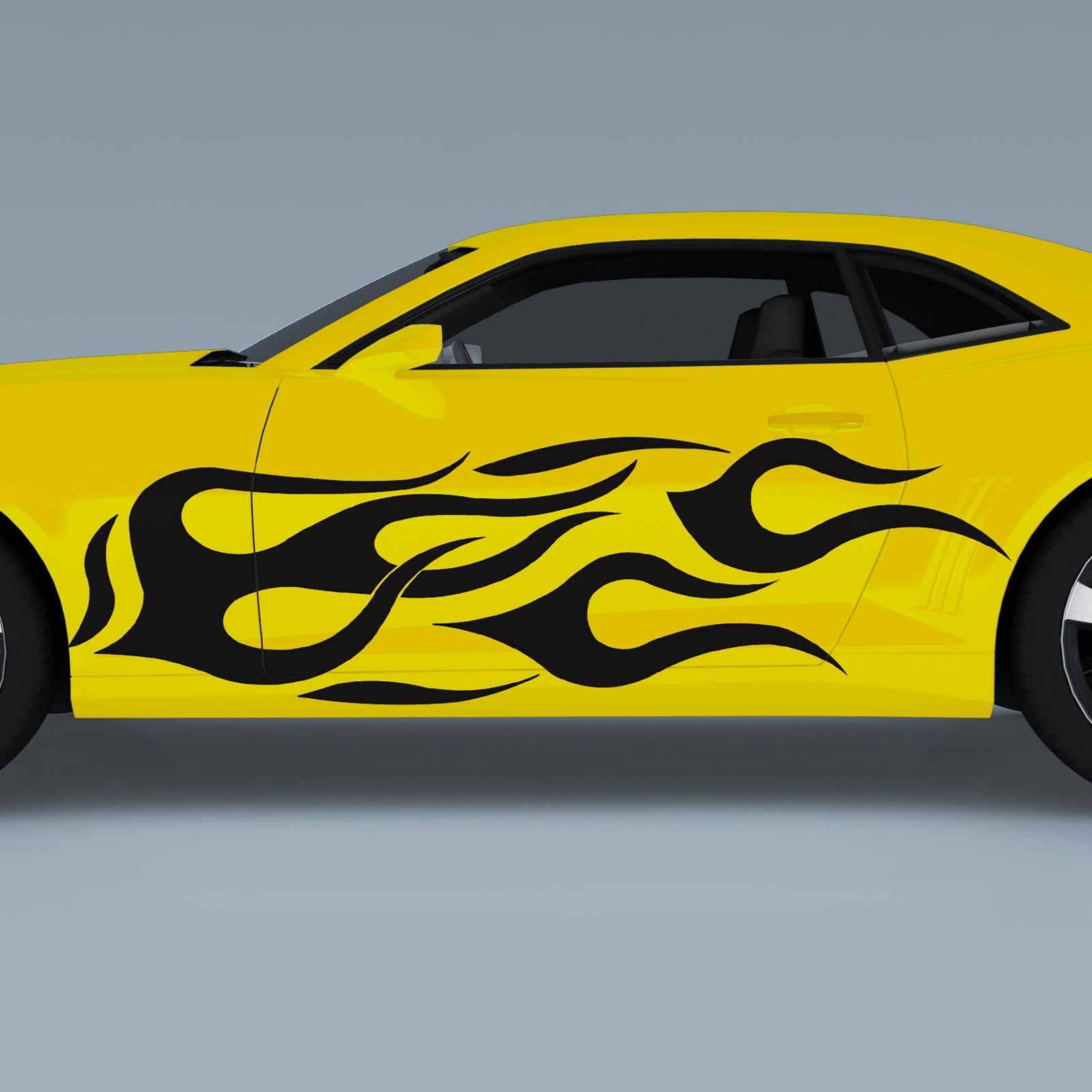 yellow camaro sports car with black vinyl flames decals on the side