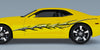 yellow camaro with checkers flames vinyl graphics on driver side