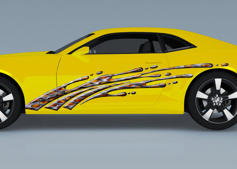 yellow camaro with flaming mud splash vinyl graphics on driver side