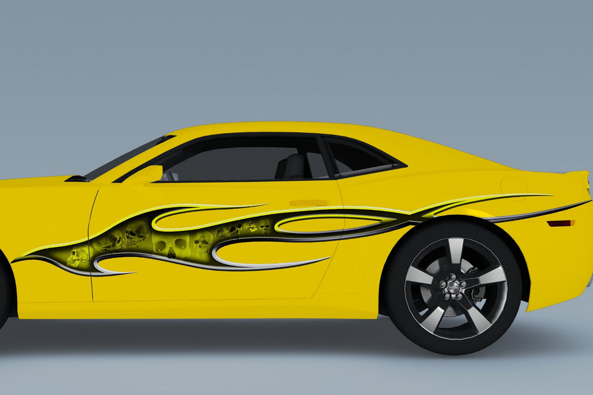 yellow camaro with inflame skulls vinyl graphics on driver side