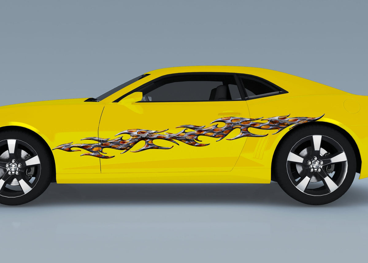 yellow camaro with tribal Flames vinyl decal on driver side
