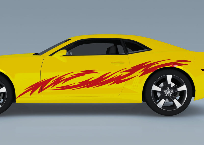 yellow camaro with tribal streak vinyl cut graphics on driver side