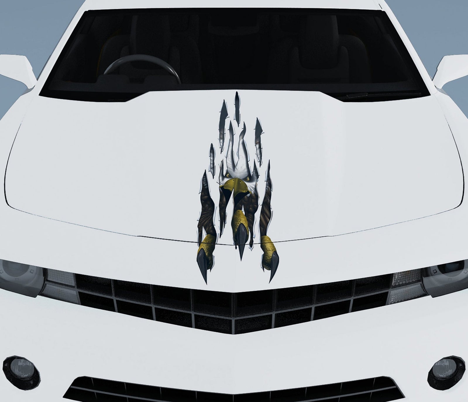 yellow camaro with eagle talon rip decal on the hood