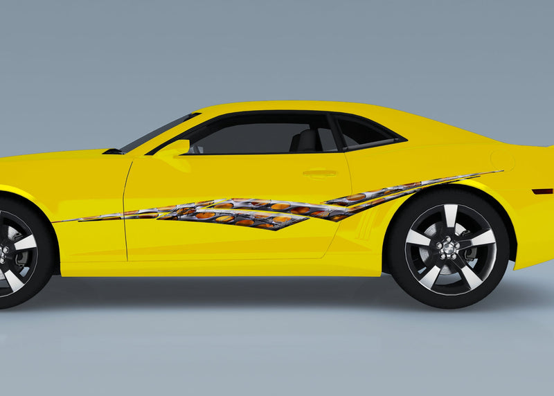 yellow camaro with flaming metal viper spear decal on driver side