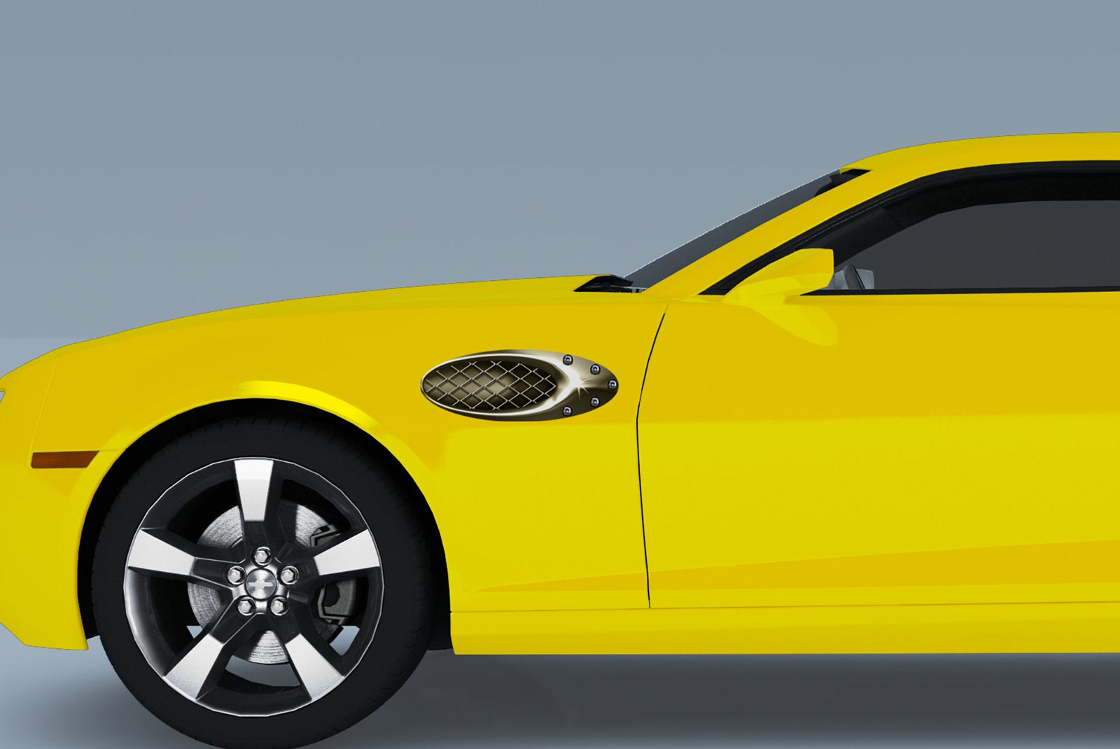 yellow camaro with gold air scoop decal on its driver side