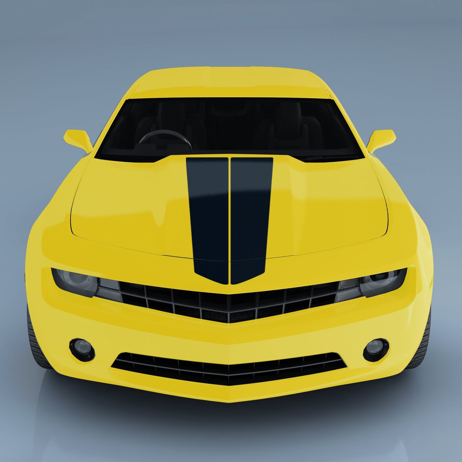 yellow camaro front view with racing stripes on the hood