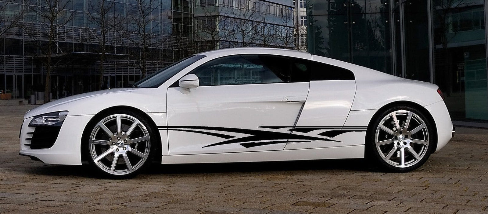 Vinyl Decal stripes on the side of white camaro sports car
