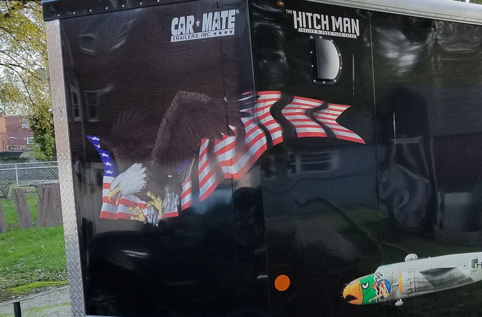 American flag bald eagle large vinyl graphic decal on the side of white semi truck. 