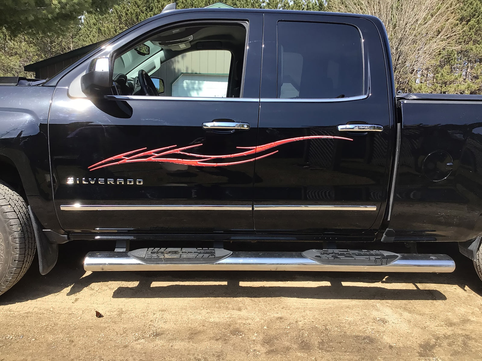 barbwire decal on big white pickup truck