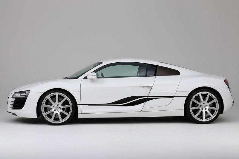 black vinyl decal stripe on sports car driver side