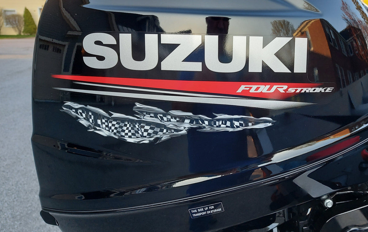 boat suzuki motor with checkers decal on it side