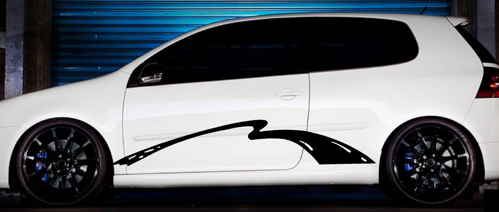 vinyl black stripe decal on the side of white truck 