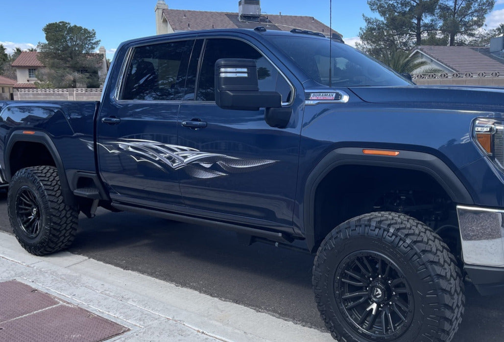 carbon fiber spear vinyl graphics on the side of white truck