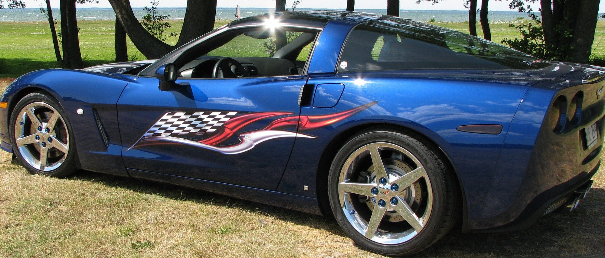 checkered flag vinyl graphics on blue corvette
