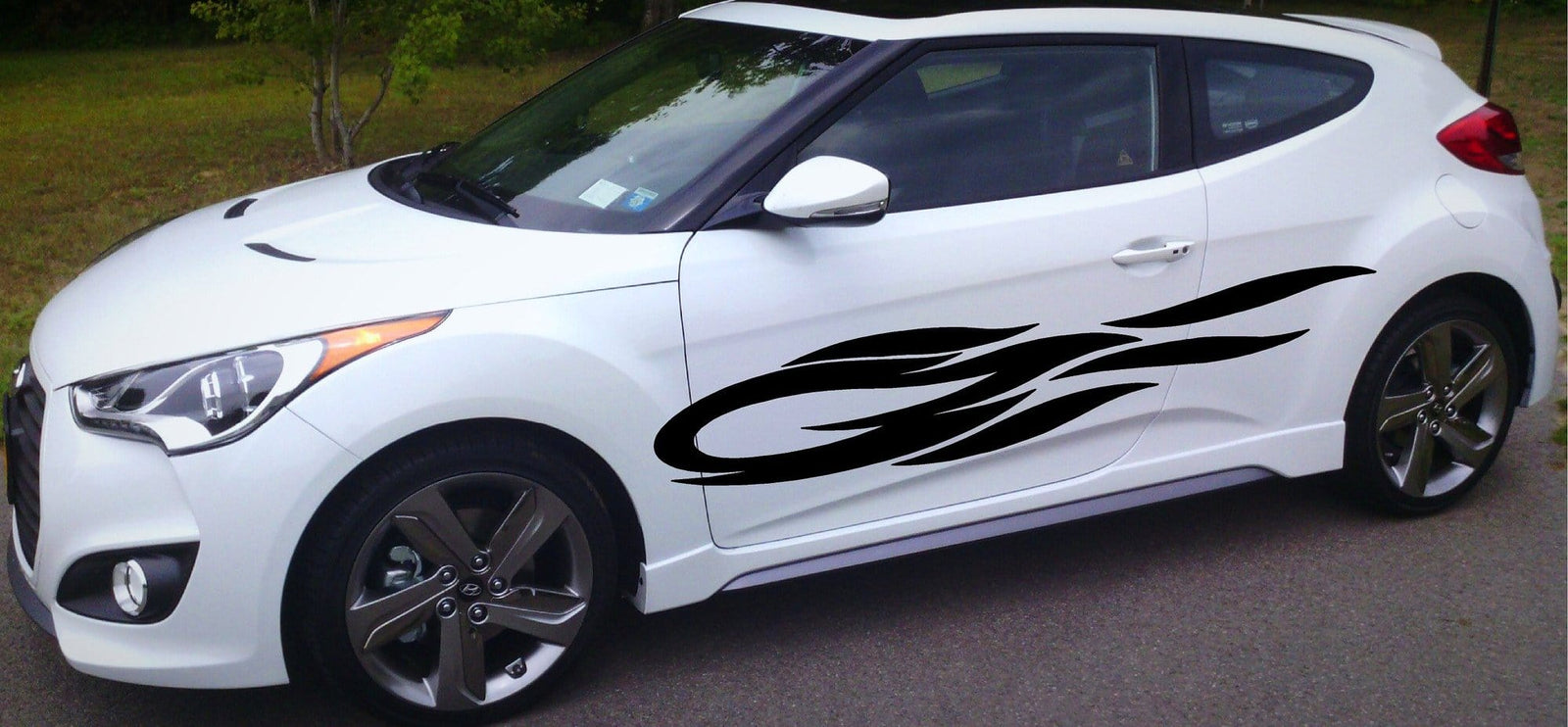 comet vinyl black decal on white car