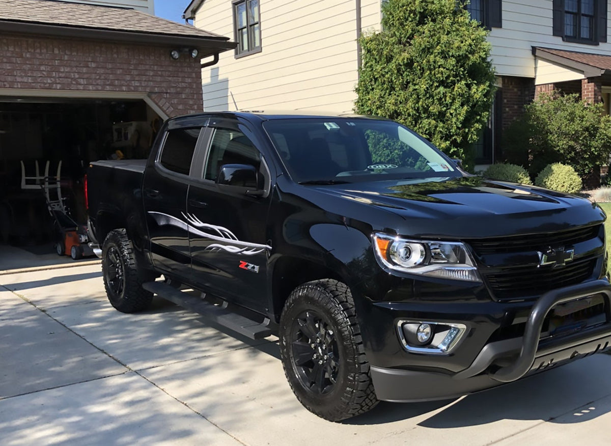 dart vinyl graphics on black pickup truck