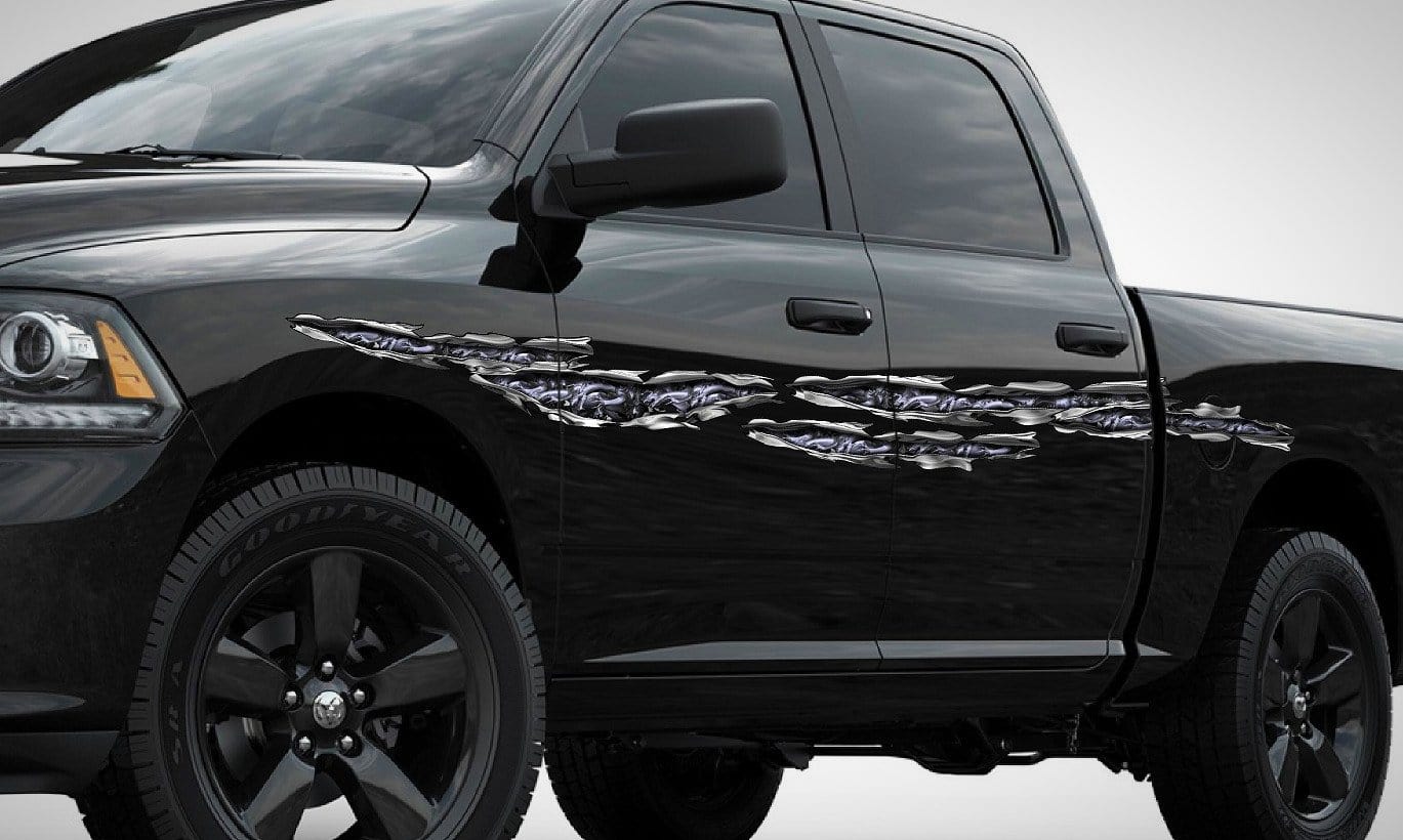 Dragons tear vinyl graphics on red truck
