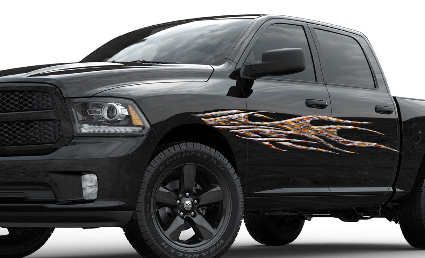 barbwire flames vinyl graphics on the side of white mustang sports car 