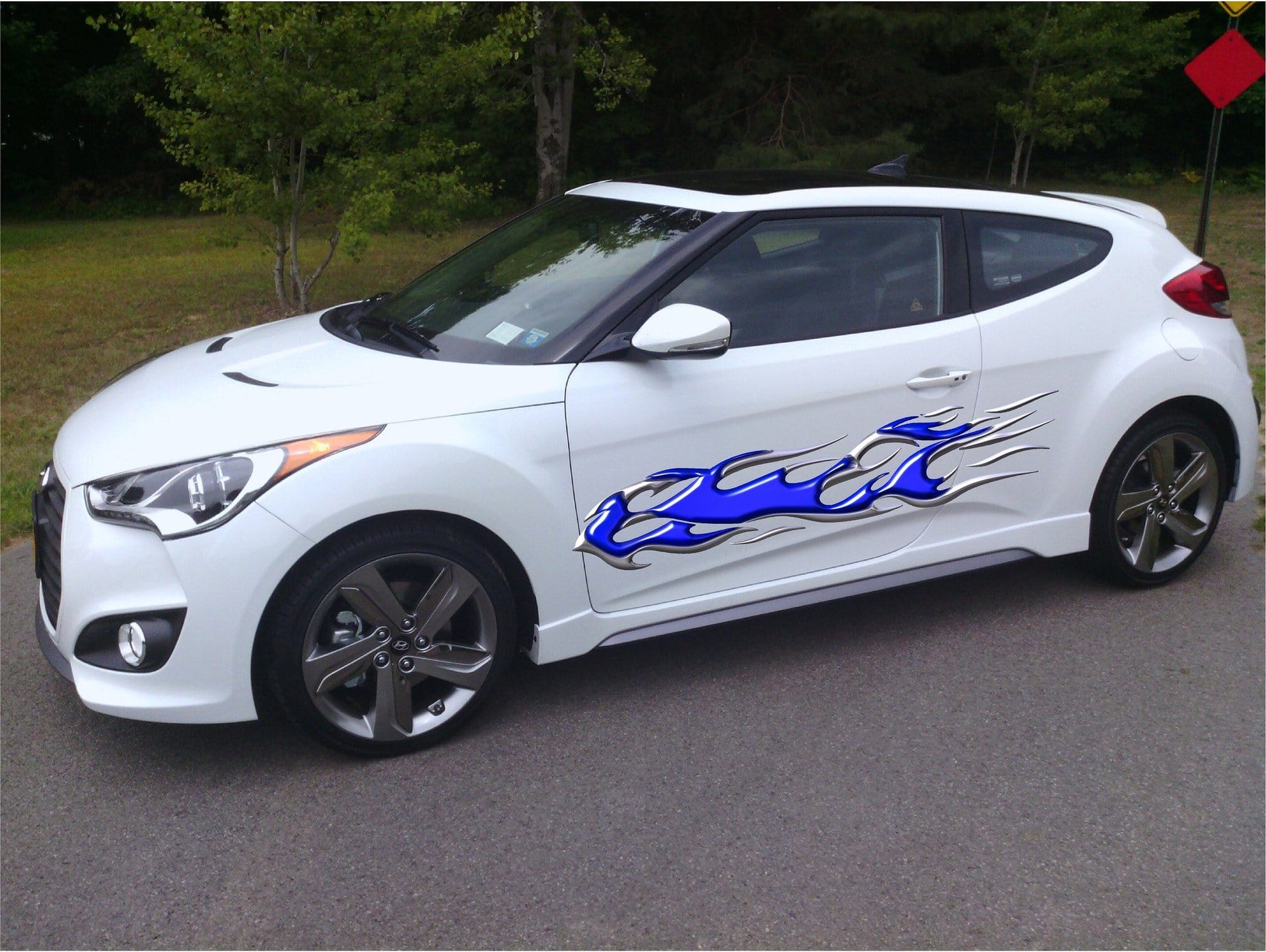 chrome flames side decals on black Suv 