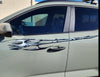 hyundai santa cruz truck with tribal edge graphics on it driver side, closeup view.