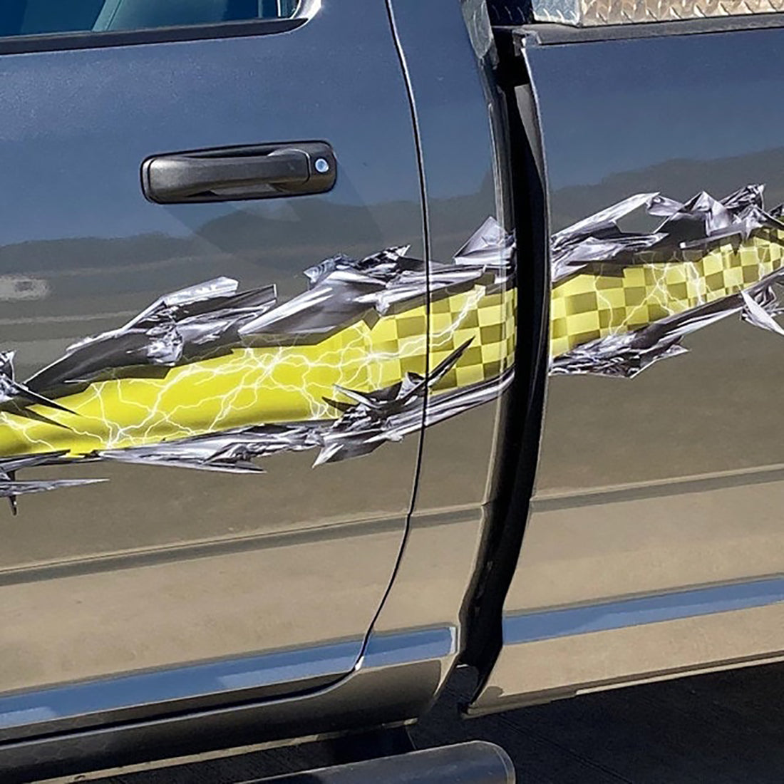 checkered flag ripper decal on the side of white semi trailer
