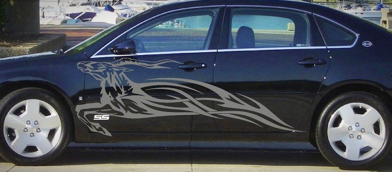 impala runing with flames vinyl decal on black chevy impala car