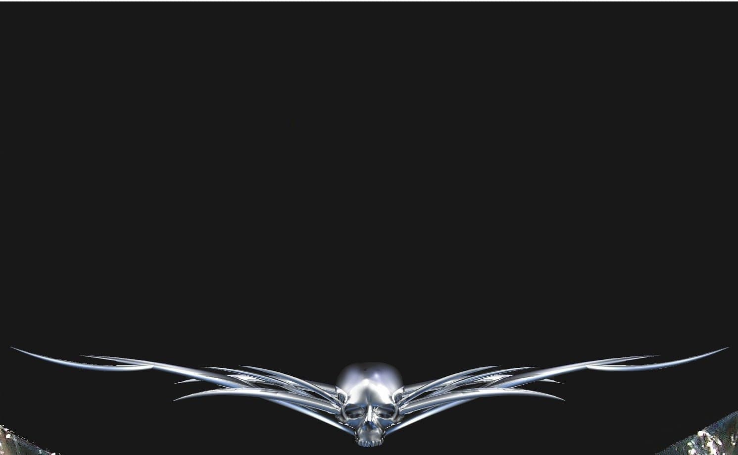 chrome horned skull vinyl decal on dodge ram front bumper