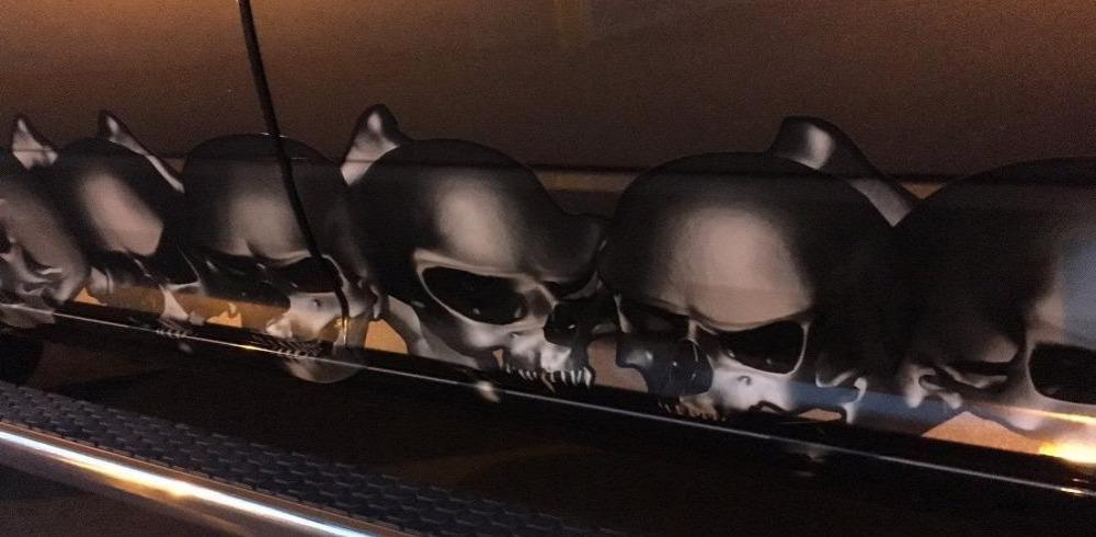 gray skulls link decal on truck rocker panel