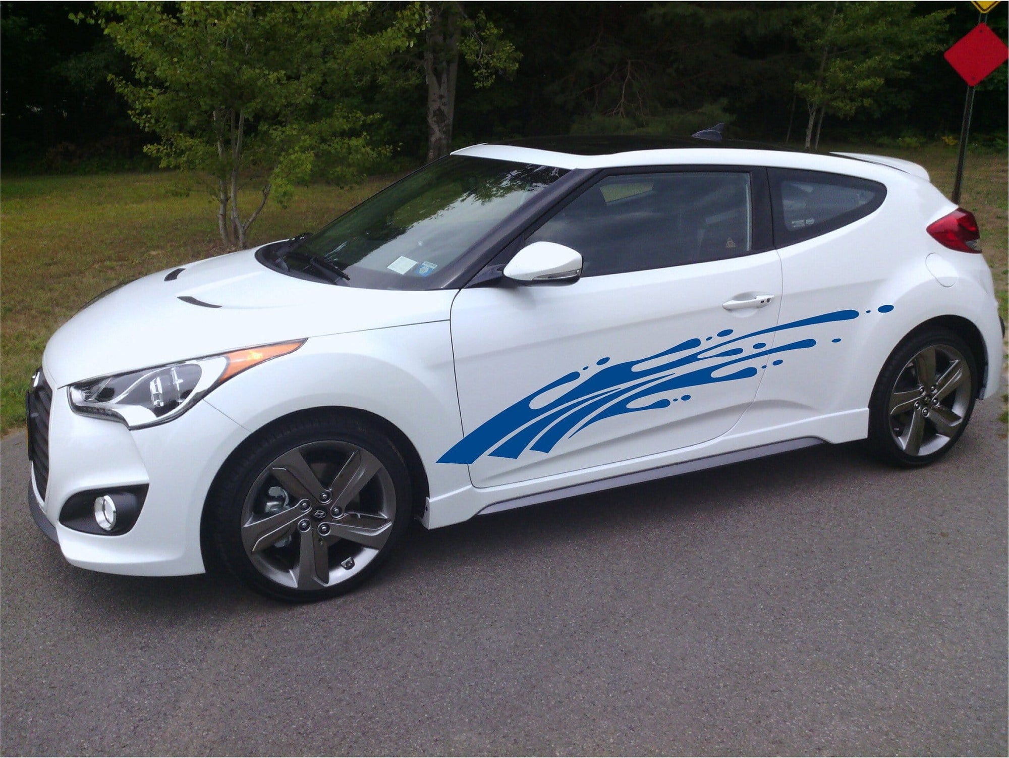red splash vinyl graphics on yellow truck
