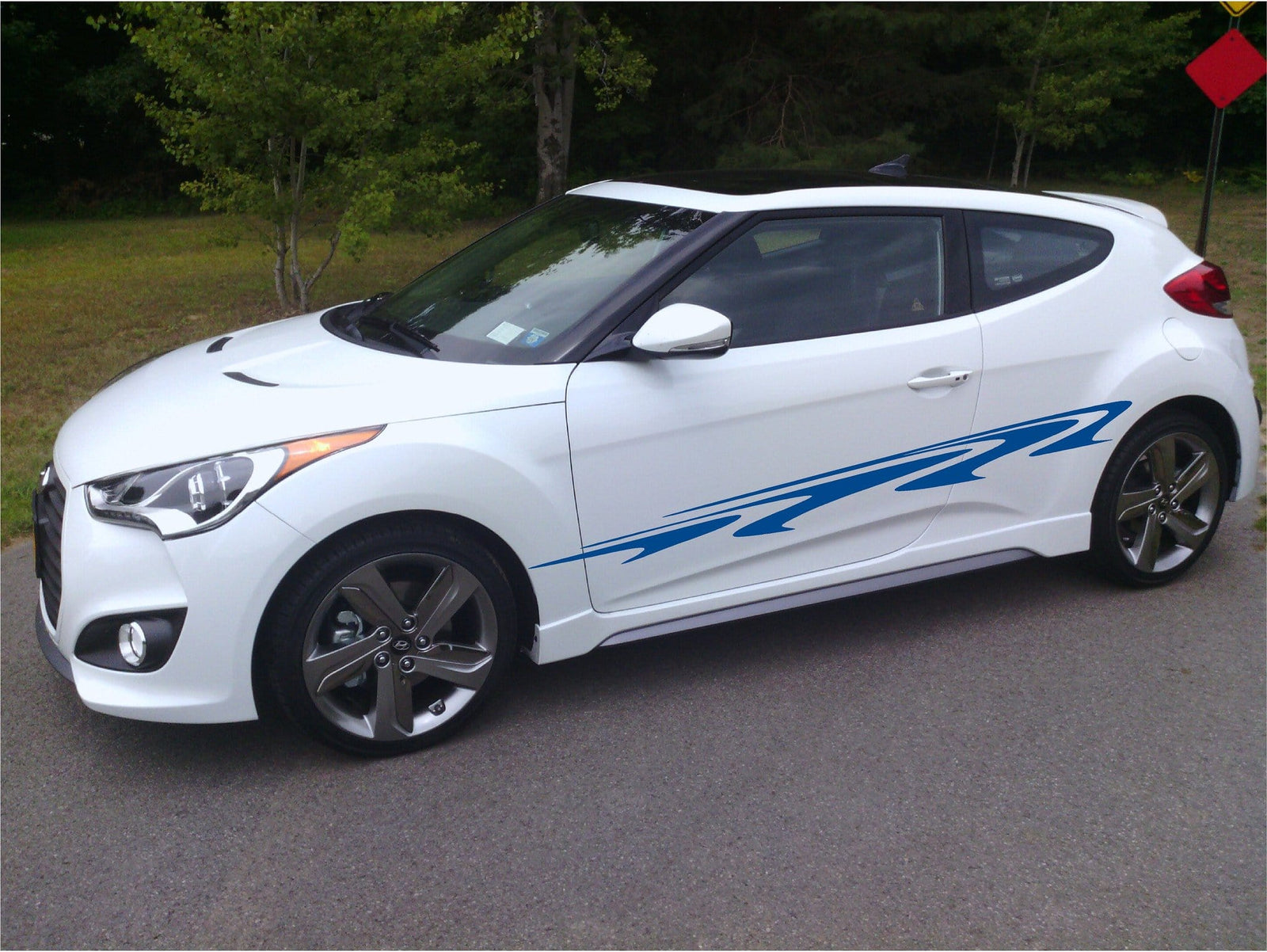 vinyl black decal stripes on the side of black truck 