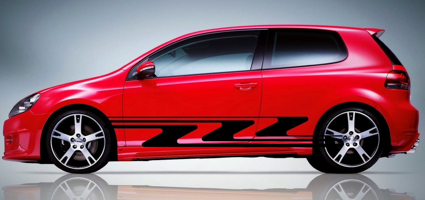 zigzag red vinyl Stripes on black hatchback car