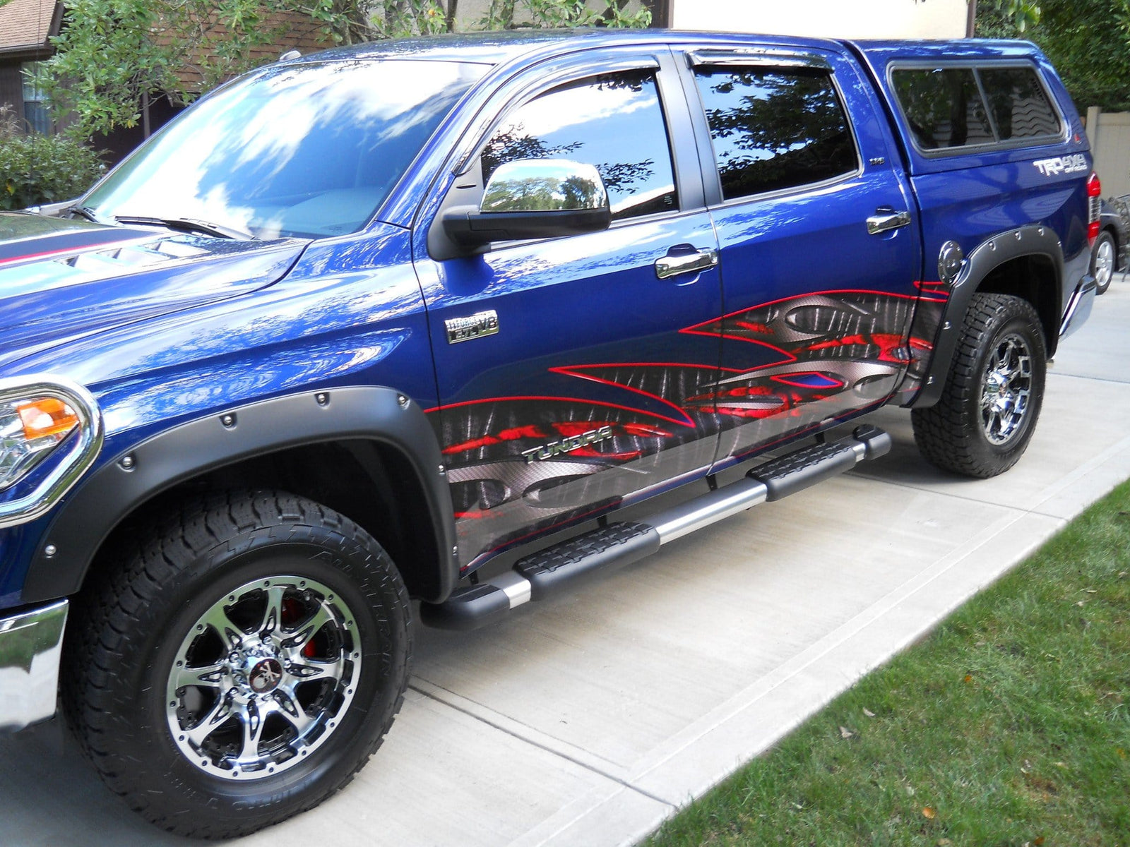 carbon fiber wave half wrap on blue truck