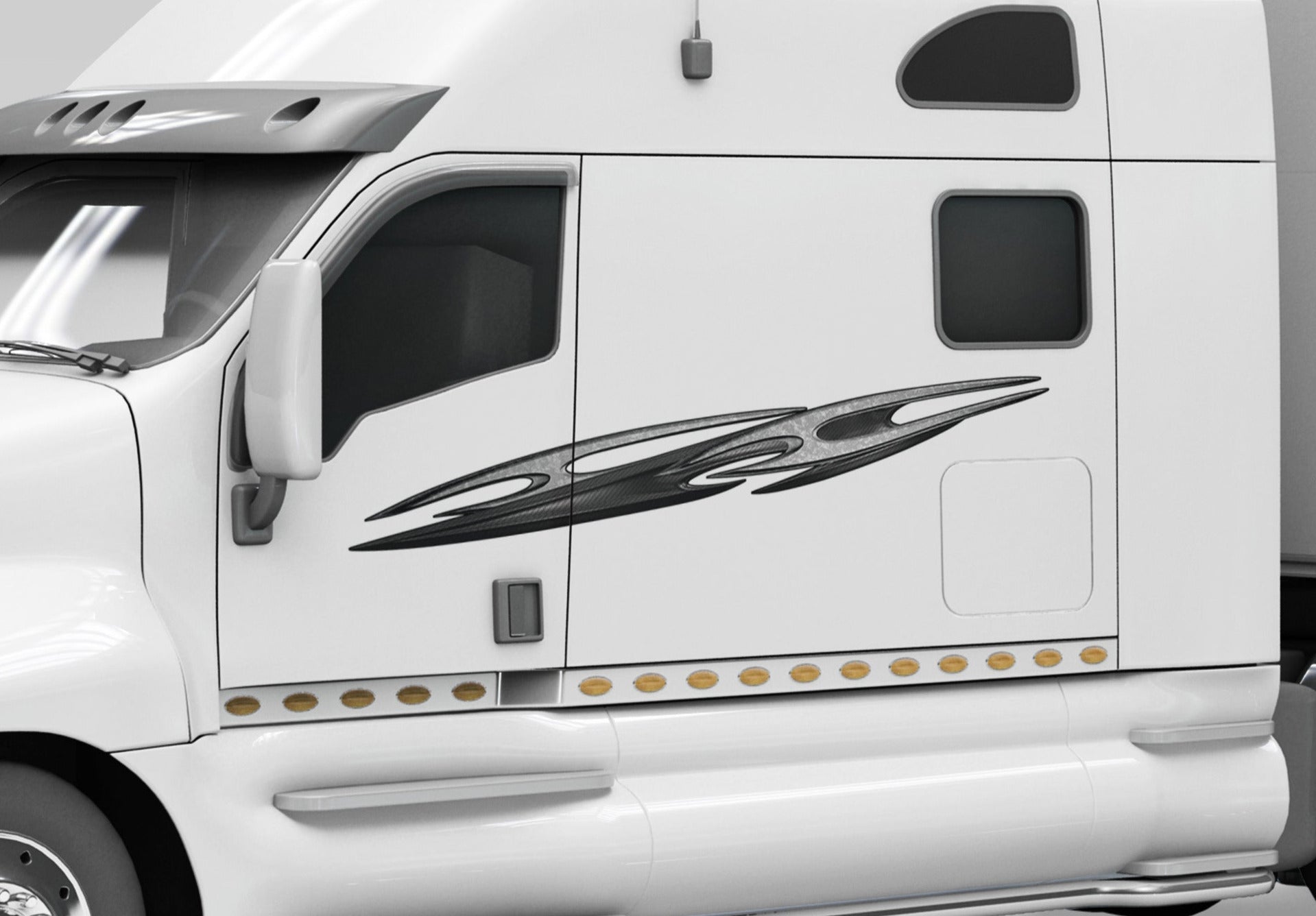 tribal carbon fiber spear decal on the side of white semi trailer