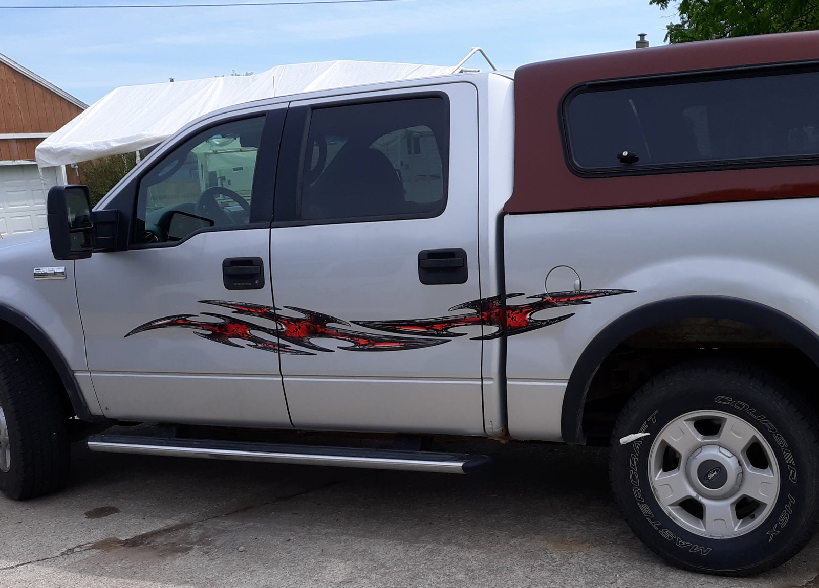 tribal flares on the side of truck  