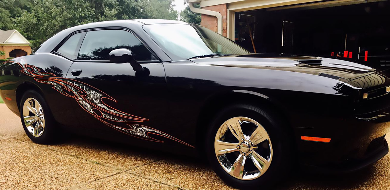 tribal steampunk vinyl graphics on black sports car