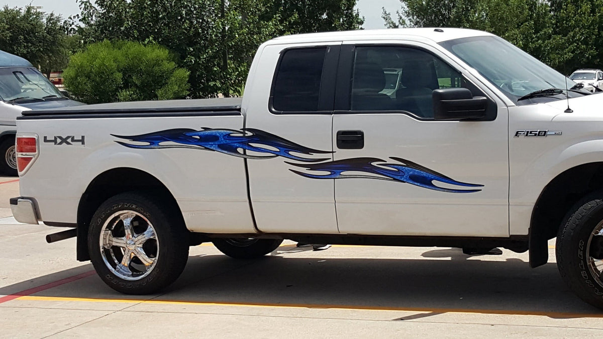 white f150 pickup with blue tribal chains vinyl graphics on passenger side